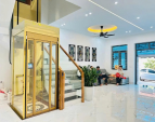 Thang máy gia đình vách kính nhỏ nhất, tiết kiệm diện tích, đẳng cấp gia chủ